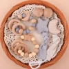 Ensemble de 2 anneaux de dentition en silicone et bois de hêtre pour bébé Ensemble de 2 anneaux de dentition en silicone et bois de hêtre pour bébé